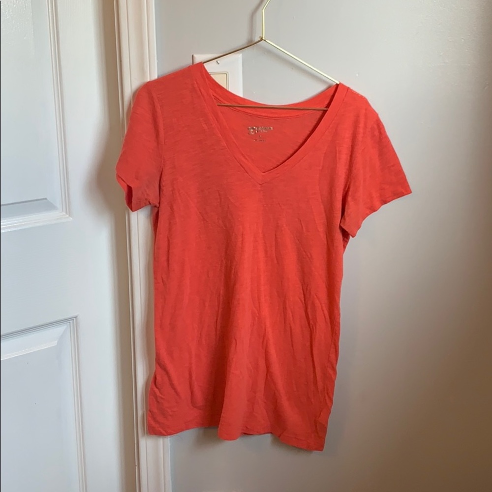 Very vibrant peachy color T-shirt